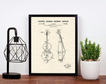 May include: Framed vintage patent print of a double bass, featuring detailed technical drawings. The print, from the United States Patent Office, is in black and white, with the patent information at the top. The print is displayed on a wooden surface.