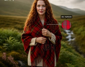 May include: A red and black plaid shawl with fringe. The shawl is draped over a person wearing a cream-colored sweater. The image includes a close-up of the plaid pattern and text that reads "50+ Tartans". The background is a scenic outdoor landscape.