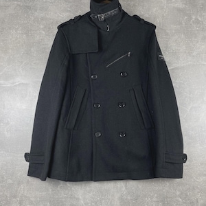May include: A black wool coat with a high collar and double-breasted button closure. The coat features a diagonal chest pocket, shoulder epaulets, and decorative cuff buttons. A stylish outerwear garment.