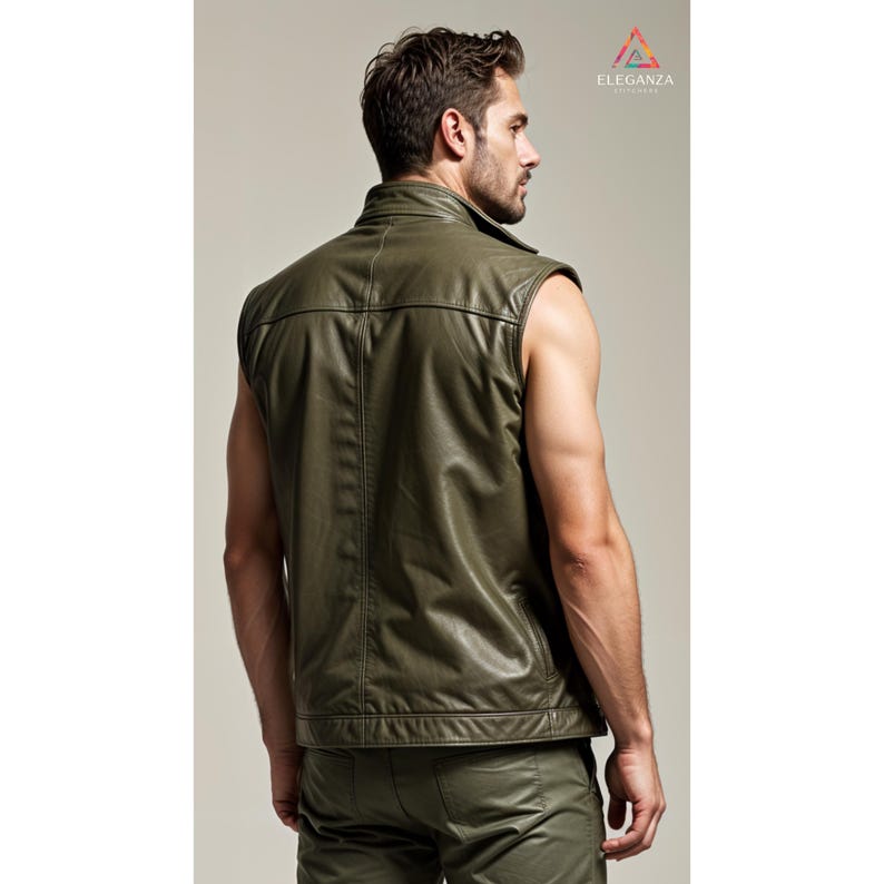 May include: A sleeveless, olive green leather waistcoat with a zip fastening. The waistcoat has a stand-up collar and a back pocket.