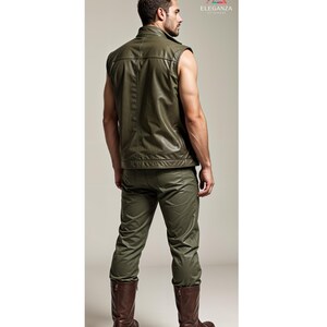 May include: A sleeveless green leather waistcoat with a zip fastening and a collared neckline. The waistcoat is worn over a green shirt and paired with green trousers and brown boots.