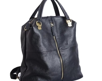 Mochila de piel de vacuno: bolso de viaje negro para mujer
