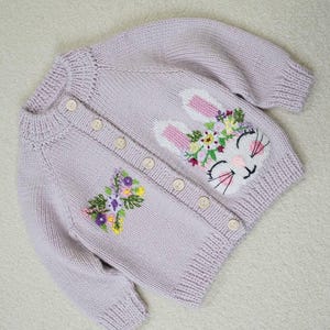 Hand-Knitted Baby Cardigan with Embroidery – Blush Rose Bunny, Size 12–18 Months