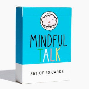 May include: A rectangular box of "Mindful Talk" cards. The box is primarily turquoise with a white base. The top features a cartoon cloud illustration and the words "Mindful Talk" in black, green, pink, and yellow. The text "Set of 50 Cards" is at the bottom.