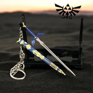 Zelda Link Master Sword Schlüsselanhänger - zu öffnender Cosplay Anhänger, Unisex Schmuck Accessoire, einzigartiges Geschenk für Gamer & Fans!