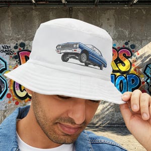 1964 Chevy Impala Hydraulics Lowrider Ink Drawing Bucket Hat - Old School Hip Hop Cholo Art Hat Design - Chicano Car Club Graphic Hat