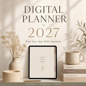 May include: A digital planner for 2027 displayed on a tablet screen with the text "DIGITAL PLANNER 2027", "Plan Your Year With Intention", "FOCUS PLAN GROW", and "ORGANIZE • PRIORITIZE • THRIVE". The tablet is surrounded by a vase, candle, and books.