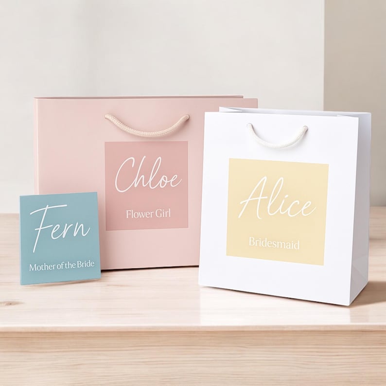 Personalised Bridesmaid Gift Bag available in 4 colours and paired with 12 × 12 cm custom gift bag stickers in 18 stunning shades—perfect as bridesmaid gift bags, maid of honour bags, and flower girl totes for your bridal party. Our luxury personalised bags are designed to feel substantial, not flimsy, making them the ultimate wedding gift bag for presenting Bridesmaid Proposal Gifts or creating memorable Bridal party gift bags.