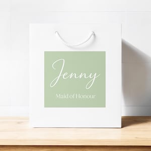 Personalised Bridesmaid Gift Bag available in 4 colours and paired with 12 × 12 cm custom gift bag stickers in 18 stunning shades—perfect as bridesmaid gift bags, maid of honour bags, and flower girl totes for your bridal party. Our luxury personalised bags are designed to feel substantial, not flimsy, making them the ultimate wedding gift bag for presenting Bridesmaid Proposal Gifts or creating memorable Bridal party gift bags.