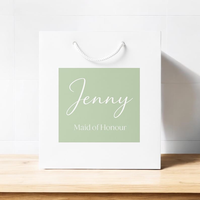 Personalised Bridesmaid Gift Bag available in 4 colours and paired with 12 × 12 cm custom gift bag stickers in 18 stunning shades—perfect as bridesmaid gift bags, maid of honour bags, and flower girl totes for your bridal party. Our luxury personalised bags are designed to feel substantial, not flimsy, making them the ultimate wedding gift bag for presenting Bridesmaid Proposal Gifts or creating memorable Bridal party gift bags.