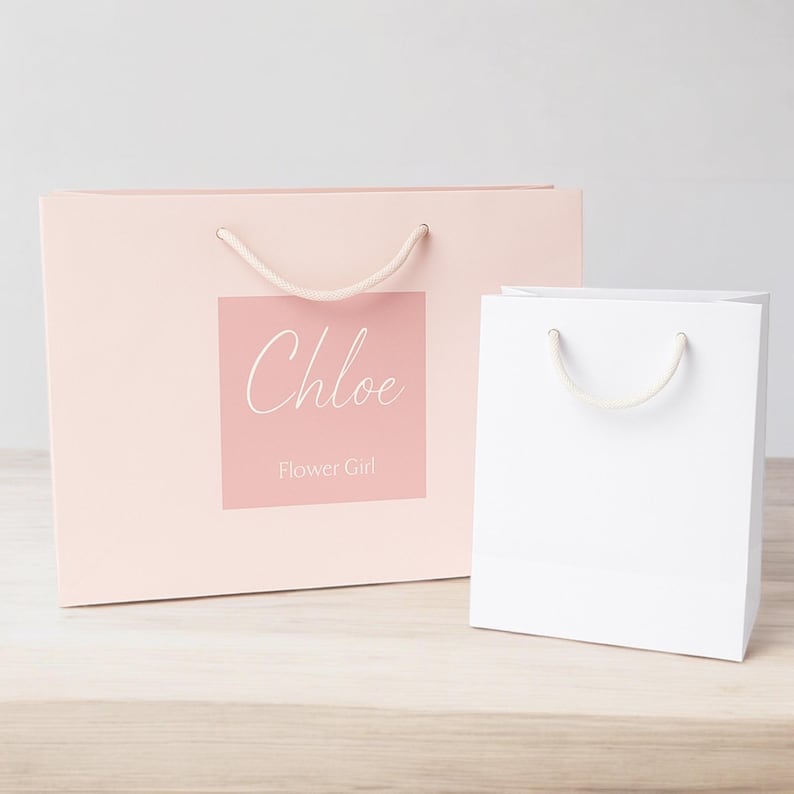 Personalised Bridesmaid Gift Bag available in 4 colours and paired with 12 × 12 cm custom gift bag stickers in 18 stunning shades—perfect as bridesmaid gift bags, maid of honour bags, and flower girl totes for your bridal party. Our luxury personalised bags are designed to feel substantial, not flimsy, making them the ultimate wedding gift bag for presenting Bridesmaid Proposal Gifts or creating memorable Bridal party gift bags.