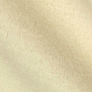 Puede incluir: Primer plano de una superficie texturizada de color blanquecino. La superficie tiene un patr&oacute;n sutil y desigual.