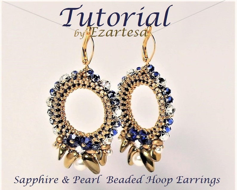 May include: A pair of gold beaded hoop earrings with a sapphire and pearl dangle. The earrings are made with small blue, white, and gold beads. The earrings are called "Sapphire & Pearl Beaded Hoop Earrings".