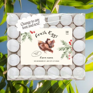 May include: A carton of 30 fresh white eggs, wrapped in clear plastic. The carton has a label with the text "Fresh Eggs" and a watercolour illustration of two brown hens. The label also includes space for a farm name and address.