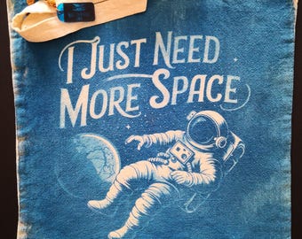 Borsa a mano e acquisti The Space Man