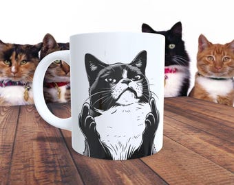Taza con forma de dedo medio de gato