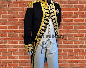 May include: A dark navy blue military-style tailcoat featuring gold braided trim, gold-tone buttons, and gold fringe epaulets, worn over a white waistcoat and light grey breeches. The jacket displays a prominent gold star emblem on the chest.