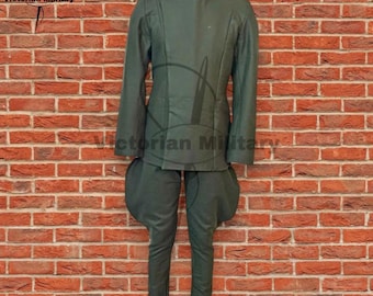 May include: A dark olive green military-style uniform consisting of a long-sleeved jacket with a high collar and matching trousers featuring flared, rounded hip sections. The jacket has a central vertical seam and long sleeves. The set is displayed on a mannequin.