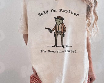 Hold On Partner I'm Overstimulated, Funny Shirts, Stimulated, Overstimulated, Comfort Colors® Shirt, Funny Frog, Meme Shirt, Trendy T-Shirt