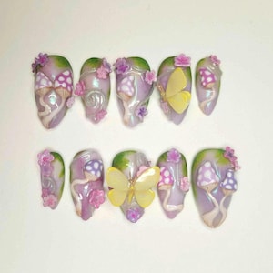 Custom handmade press on nails- Mystical Mushroom nails with hand sculpted butterflys and a glitter encapsulation.