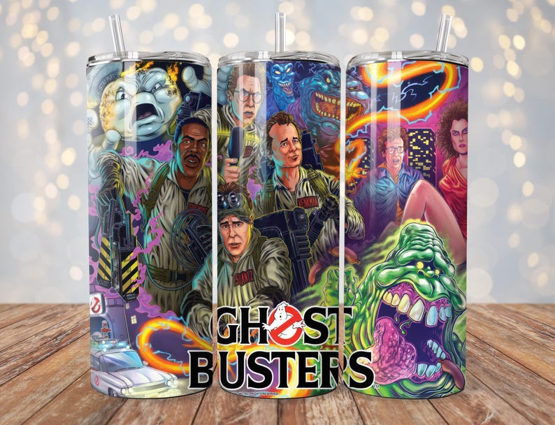 May include: A set of three stainless steel tumblers with colorful Ghostbusters themed graphics. The tumblers feature characters from the movie, including Slimer, Peter Venkman, and Egon Spengler. The text "Ghostbusters" is printed on the tumblers.