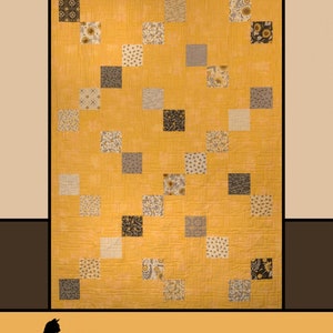 May include: A handmade quilt with a yellow background and a patchwork design. The quilt features square patches in various patterns, including floral and geometric designs. The text "Bee Charming" is at the top, with "Melissa Milligan for Villa Rosa Designs" at the bottom.