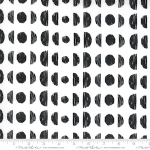 May include: White fabric with a repeating pattern of black half-circles and dotted circles. Some half-circles have vertical lines. The word "moda" is printed at the bottom.