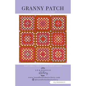 May include: A quilt pattern titled "GRANNY PATCH" by Brittany Lloyd. The quilt design features nine square blocks with a brown background and colorful squares in shades of pink, red, and blue. The pattern is available in baby, small throw, large throw, and queen sizes.