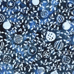 May include: A dark blue fabric featuring a repeating white pattern of Christmas ornaments and string lights. The ornaments include various designs such as stars, stripes, dots, and snowflakes, all interconnected by a continuous vine of light bulbs.