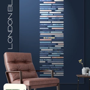 May include: A modern interior design scene featuring a brown leather armchair, a small side table, and a decorative wall art piece with a blue and white abstract design. The wall is painted a deep blue, and the text "LONDON BLUES" is visible.