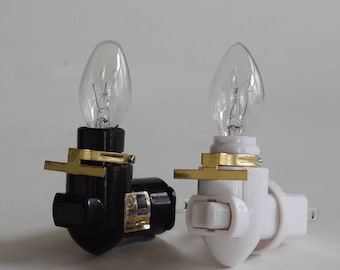 Rotating night light plug - bulb - brass clip