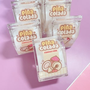 May include: Four clear plastic containers with white lids. Each container has a label that says 