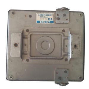 May include: A silver metal electronic component, rectangular with mounting brackets. It features a central circular indentation and a label with the text "33920-59650 E2T42-71 4317H D1 DOM-MT".