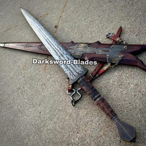 May include: A detailed image of a dagger with a patterned blade and wooden handle, resting on a wooden sheath. The sheath has metal accents and leather straps. The text "Darksword-Blades" is visible on the image.