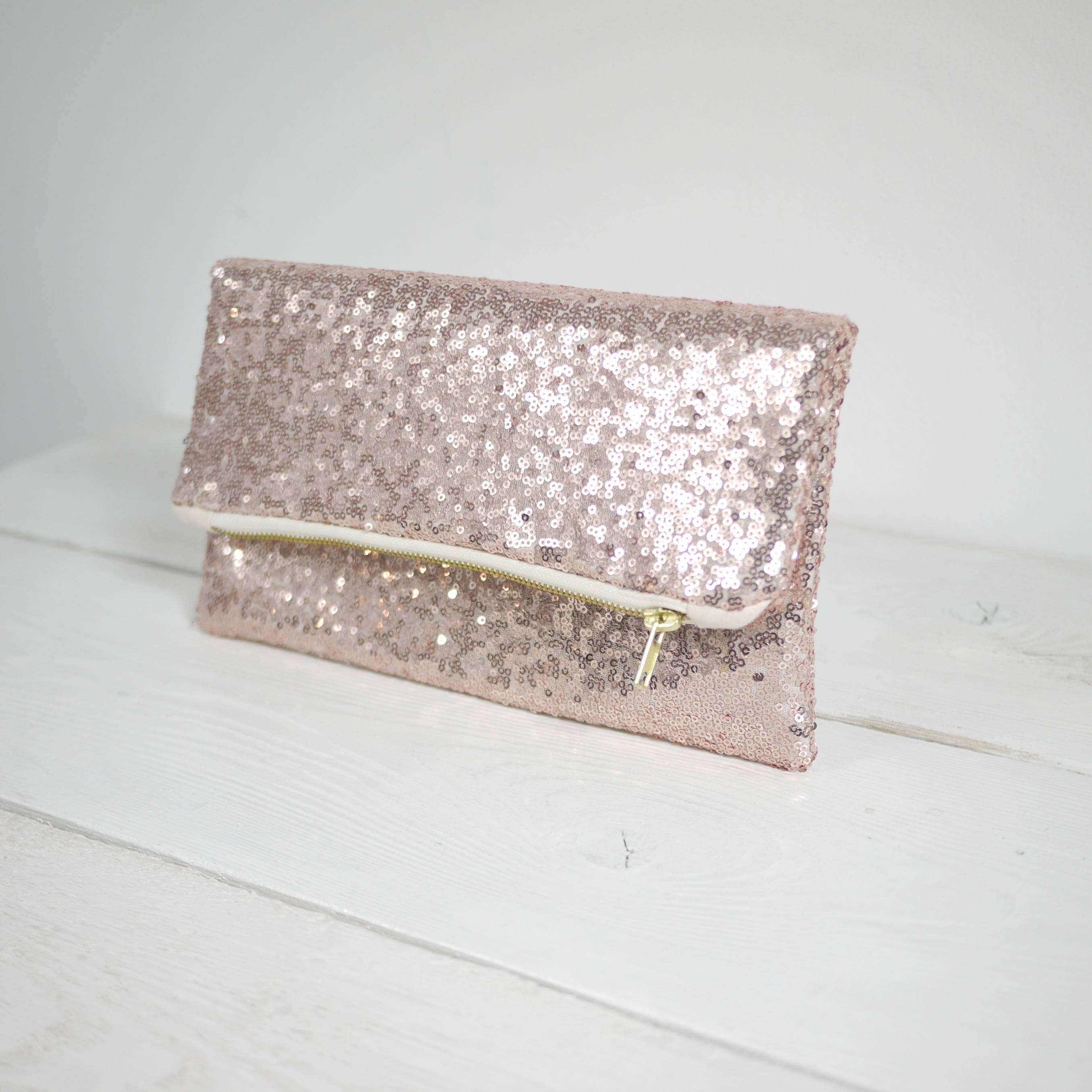 rose gold sequin clutch