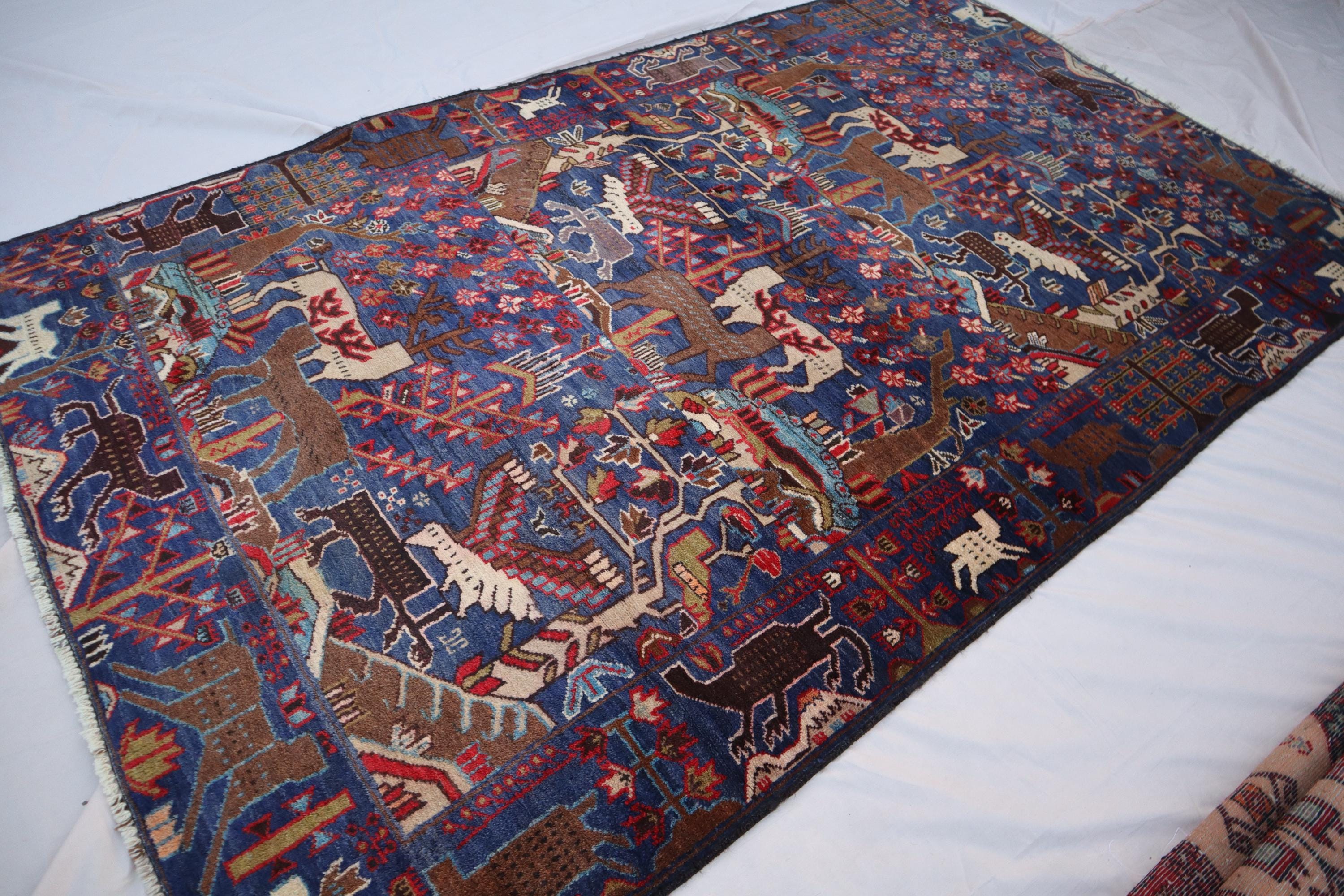 アフガニスタンの絵画的ラグ：4x7インチのヴィンテージ手織り