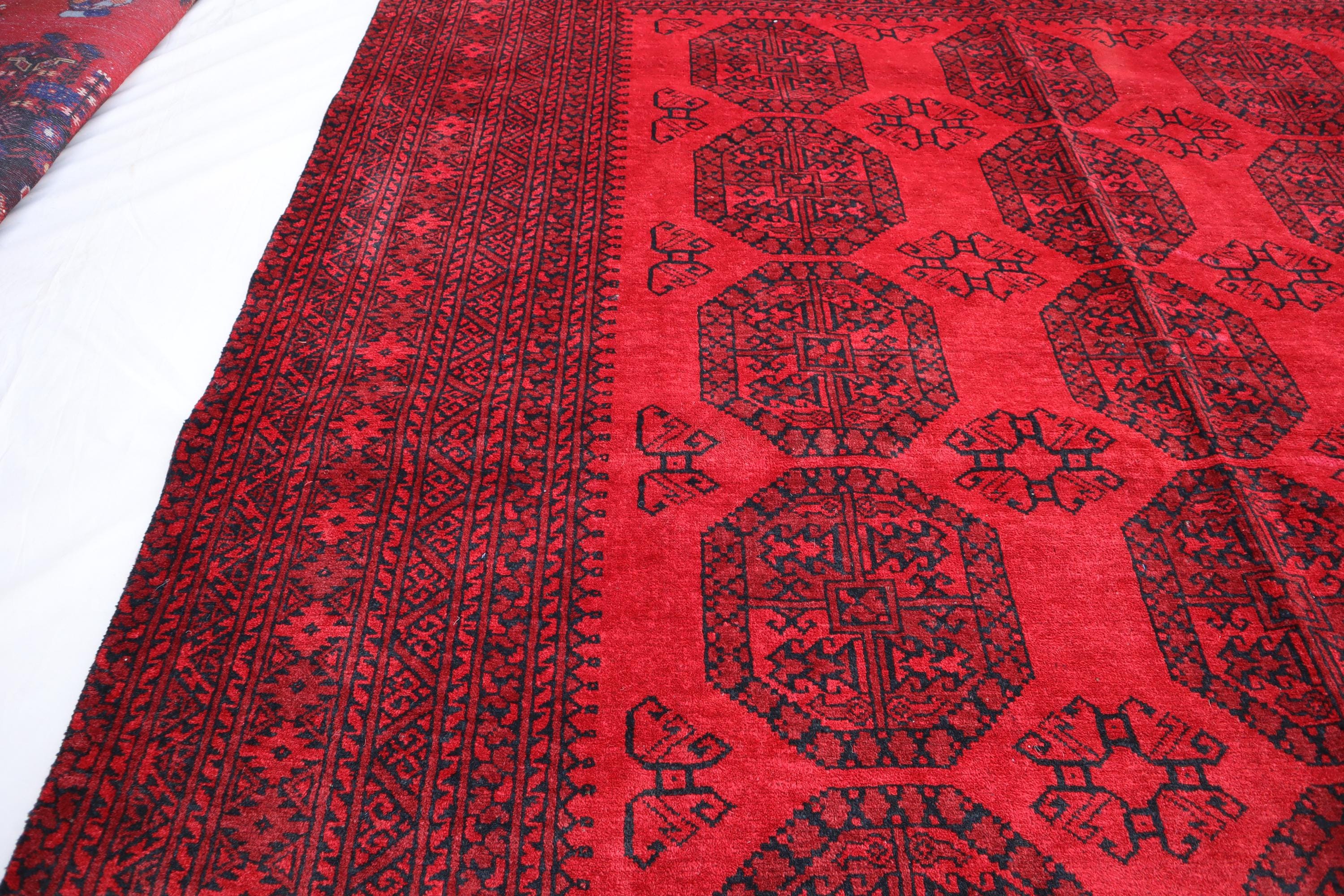 手織りトルクメンウールラグ：6x9 赤い象の足のデザイン - Etsy 日本