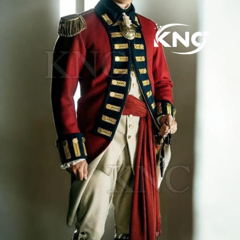 May include: A red military-style jacket with gold trim and epaulets. The jacket has a high collar and is paired with cream-colored pants and a red sash. The outfit is reminiscent of historical military uniforms.