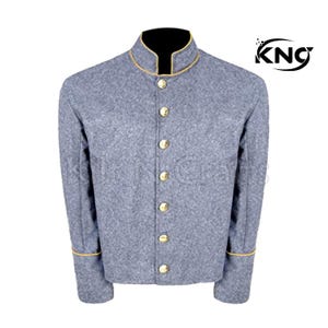 May include: A set of three ceramic mugs with a speckled, matte finish. The mugs are in shades of cream, light gray, and dark gray. Each mug has a simple, minimalist design, perfect for coffee or tea.