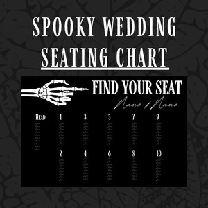 May include: Black and white spooky wedding seating chart with a skeleton hand pointing to the right. The chart has the words "Find Your Seat" and "Name & Name" at the top. The chart is divided into ten columns, labeled with numbers 1 through 10. Each column has a list of names.