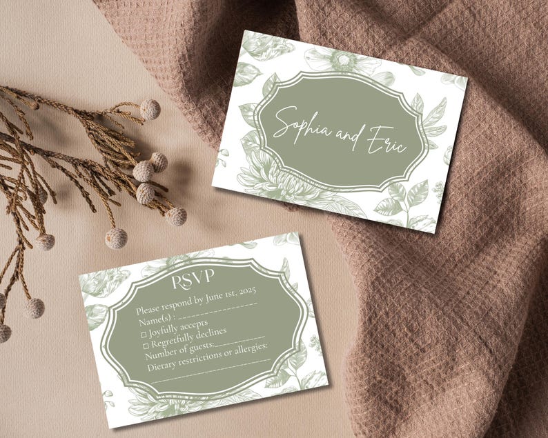 May include: A white RSVP card with green floral designs and text that reads "RSVP Please respond by June 1st, 2025 Name(s) Joyfully accepts Regretfully declines Number of guests Dietary restrictions or allergies" and a separate card with green floral designs and text that reads "Sophia and Eric"