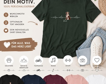 May include: Dark green t-shirt featuring a dog illustration and a heartbeat line design. The shirt has the text "Bowie" under the dog. Additional shirts with various designs are displayed below, including a mountain, motorcycle, music note, and camera.