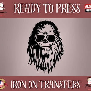 May include: Black and white graphic of a furry creature wearing sunglasses. The text "READY TO PRESS" is at the top, and "IRON ON TRANSFERS" is at the bottom. The image has a light purple background.