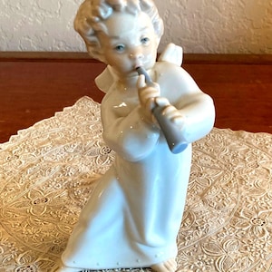 Scarce Premier Edition Lladro Angel Figurine with flute; Cherub with Horn by Fulgencio García, 1960s, Retired, Rare Variant; Mint Condition