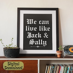 Può includere: Arte da parete stampabile in bianco e nero con il testo "We can live like Jack & Sally" in un font gotico.