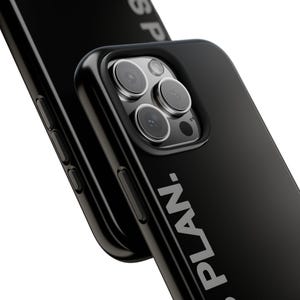 May include: Black phone case with the word "PLAN." printed in white. The case has a glossy finish and a raised edge around the camera lenses. The phone's camera lenses are visible.