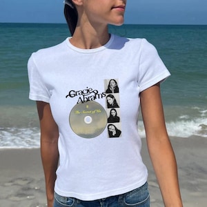 Gracie Abrams Baby Tee | Concert, Pinterest, The Secret Of Us, Popstar, Fangirl, Y2K, Music