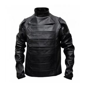 May include: A black leather jacket with a high collar and multiple horizontal panels across the chest. The jacket features a button closure and a fitted silhouette, with long sleeves and a zipper detail on the upper arm.