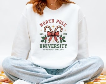 Sudadera con corona de bastón de caramelo de la Universidad del Polo Norte