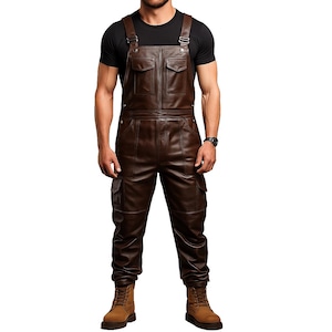 May include: Brown leather overalls with two chest pockets and two side pockets. The overalls have adjustable straps and are worn with a black t-shirt and brown boots. The overall design is a classic workwear style.
